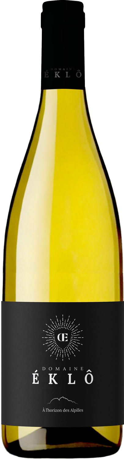 Bottle of Domaine Éklô white wine with a black label featuring a sunburst design and the text 'À l'horizon des Alpilles.'
